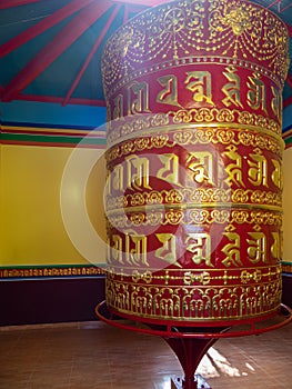 Prayer mill. Very large prayer wheels contain billions of mantras