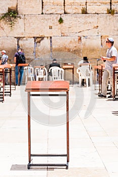 Prayer table standing near the Western Wall, holy place, the last remains of Jewish Temple in Jerusalem, Israel