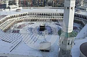 Prayer and Tawaf of Muslims Around AlKaaba in Mecca, Saudi Arabia photo