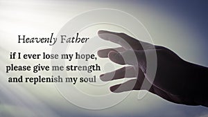 Prayer to Heavenly Father with hand reaching out to bright shining light background.