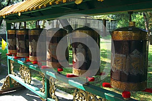 Prayer wheel in Chengde Tibetan Buddhism monastery photo