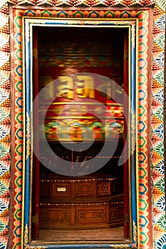 Prayer wheel of Drubgon Jangchup Choeling Tibetan Temple, Kathmandu, Nepal photo