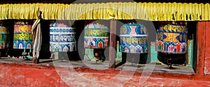 Prayer wheel in Nepali near the Buddhist temple