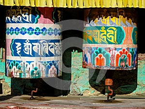 Prayer wheel in Nepali near the Buddhist temple