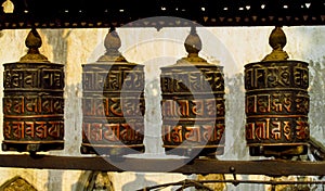 Prayer wheel in Nepali near the Buddhist temple