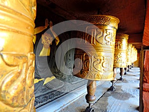 Prayer wheel with painting at Chimi Lhakhang, Bhutan