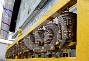 Prayer wheels at Bodhnath stupa in Kathmandu