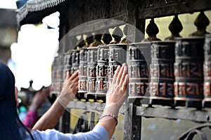 Prayer wheels in Boudhanath