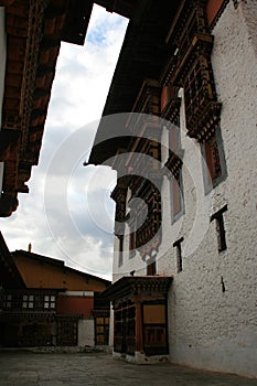 prayer wheels in a buddhist fortress (rinpung dzong) in paro (bhutan)