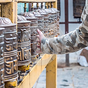 Prayer wheels in the buddhist temple