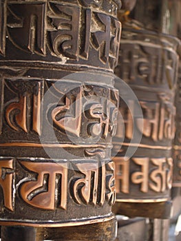 Prayer wheels in buddhist temple