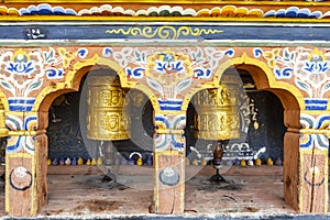Prayer wheels at  Chimi Lhakhang monastery close to Punakha, Bhutan