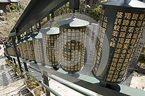 Prayer wheels in Daishouin Buddhist temple, Japan