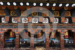 Prayer wheels in the Kyichu Lhakhang temple in Paro Valley, Bhutan