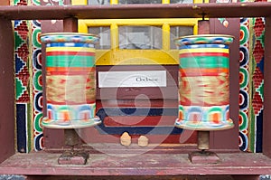 Prayer wheels at the Pemayangtse Monastery, Sikkim, India photo
