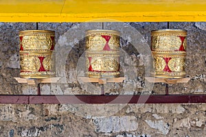 Prayer wheels, prayer's rolls of the faithful Buddhists.Line of