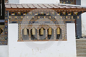 Prayer wheels repeating Buddhist mantra