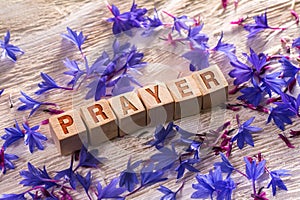 Prayer on the wooden cubes photo