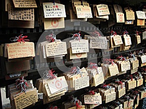 Prayers near a japanese shrine photo