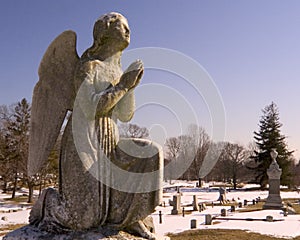 Praying Angel in cemetery