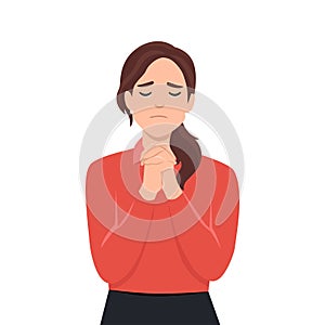 Praying, asking for God help concept. Young girl with folded hands and closed eyes, crying, asking for forgiveness, repenting,