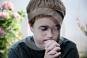 Praying boy