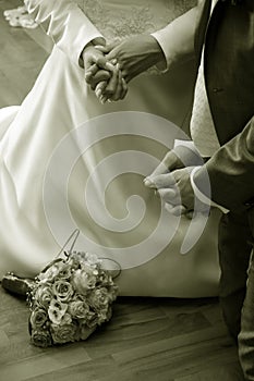 Praying bride and groom