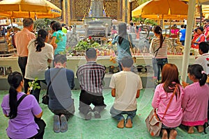 Praying buddhists