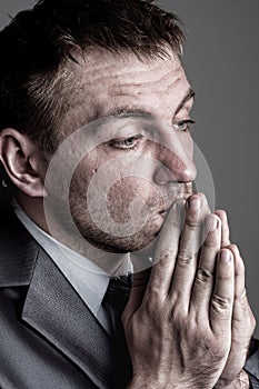 Praying businessman