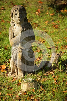 Praying child sculpture