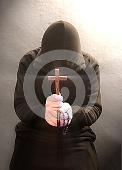 A praying christian monk