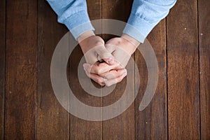 Praying hands of man