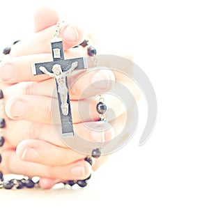 Praying hands with rosary photo