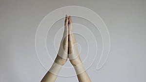 Praying hands of a woman,  background - close up