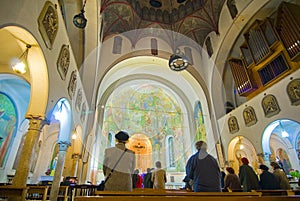 Praying inside Catholic church photo