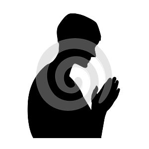 Praying man black silhouette on white background