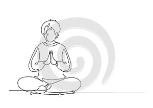 Praying man in lotus pose