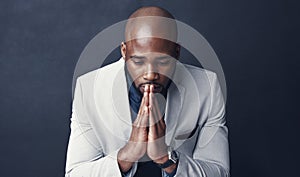 Praying, thinking and business man with faith for career, job or opportunity, asking god for help and support. Corporate