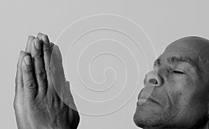 praying to god Caribbean man praying with background stock photos stock photo