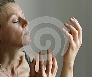 praying to God worshipping with hands together with people stock image stock photo