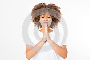 Praying young afro american girl. African woman in summer shirt on white background. Copy space. Mock up. Make a wish.