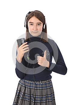 Pre-adolescent girl listening to music on smartphone