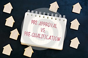 Pre-Approval vs Pre-Qualification mortgage words and homes. photo