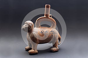 Pre-columbian animal-shaped ceramic called `Huaco` from unidentified ancient Peruvian culture.