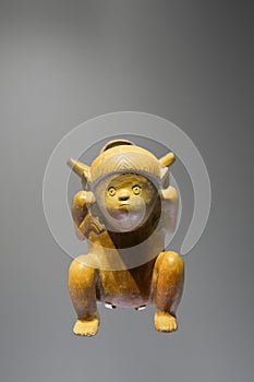 Pre-Columbian gold artifact - statuette in the Museo del Oro - Gold Museum located in Bogota, Colombia.