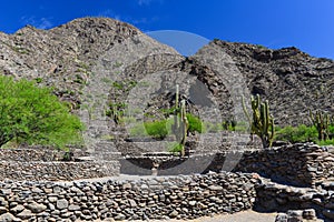 Pre-Columbian ruins in a barren landscape
