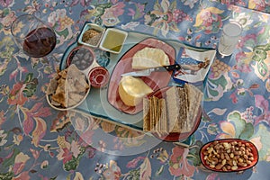 Pre-dinner snacks on a print tablecloth