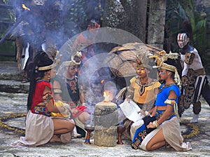 Pre-Hispanic Mayan amerindian people performance into the jungle