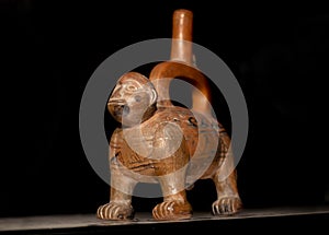 Pre inca red ceramic called `Huacos` from pre columbian Peruvian culture.