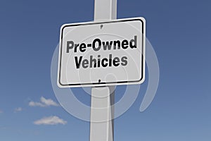 Pre Owned Vehicles sign at a Used Car Dealership photo